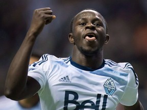Whitecaps Kekuta Manneh, here celebrating a goal against FC Dallas in Vancouver on April 23, was coached by Ottawa Fury mentor/GM Paul Dalglish in 2012. — The Canadian Press files