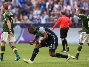 Vancouver Whitecaps centre back Kendall Waston, shown celebrating his team’s win over the visiting Portland Timbers earlier this month, will be back in the team’s lineup on Sunday after serving a one-game suspension and will face the Timbers again in the Rose City.