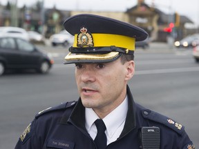 VANCOUVER. DECEMBER 25 2013.  RCMP officer Tim Shields addresses the media at 200 St and 72nd Ave to give details on a police shooting of a stolen car by Surrey RCMP officers, Langley December 25 2013.  Gerry Kahrmann  /  PNG staff photo) ( for Prov / sun News )   [PNG Merlin Archive]