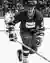 Don Lever of the Canucks skates against the Bruins at Boston Garden.