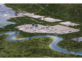 A model at the LNG Canada offices in Kitimat, B.C., shows the proposed liquified natural gas liquification plant and marine terminal, June 26, 2014. The Rio Tinto Alcan smelter is in the background. THE CANADIAN PRESS/Robin Rowland