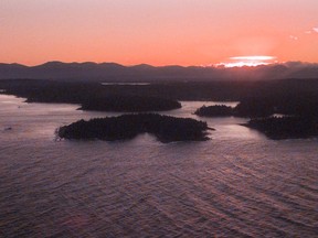 The Transportation Safety Board is investigating a collision between two tug boats that caused one vessel to sink near Gabriola Island, off the east coast of Vancouver Island. The sun goes down over Gabriola Island in this file photo.