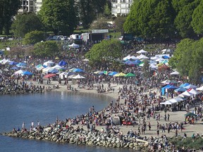 Thousands of people gather at 4/20 celebrations on April 20, 2016 at Sunset Beach in Vancouver, Canada. According to the city's 311 records, there were more complaints about 4/20 this year than last year’s Pride Parade, Celebration of Light finale and Hallowe’en combined.