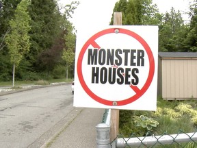 A sign near Ioco and April roads protests large homes being built in the area. Adam Foster/PNG.