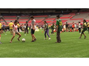 Children from 14 schools making up 60 teams spent the day playing mini-soccer games against other elementary schools. — Mike Bell/PNG