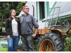 Paige Dampier and Chris Bodnar, co-owners of Close to Home Organics Ltd., pose for a photo at their farm.