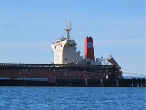 A freighter being loaded with coal at Westshore Terminals coal site in South Delta.