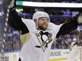 Pittsburgh Penguins right wing Phil Kessel celebrates his goal during the third period of Game 3 of the NHL hockey Stanley Cup Eastern Conference finals against the Tampa Bay Lightning, Wednesday, May 18, 2016, in Tampa, Fla.