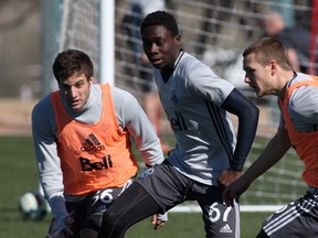 Alphonso Davies, centre.