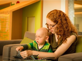 Kirsten Loran plays with her son Rowan at Ronald McDonald House in Vancouver as the toddler undergoes treatment for a rare blood disorder.