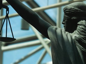 Scales of Justice statue at BC Supreme Court in Vancouver, BC Thursday, May 5, 2016.