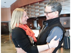 Dr. Steve Larigakis, who was diagnosed with a rare T-cell lymphoma in 2011, meets Katie Karker, the American bone marrow donor who save his life, in Richmond on May 11.