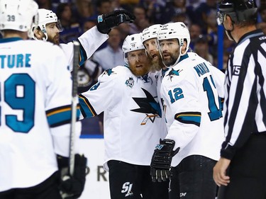 ST LOUIS, MO - MAY 23:  Joe Pavelski #8 of the San Jose Sharks celebrates with Joe Thornton #19, Patrick Marleau #12 and Brent Burns #88 after scoring a second period goal against the St. Louis Blues in Game Five of the Western Conference Final during the 2016 NHL Stanley Cup Playoffs at Scottrade Center on May 23, 2016 in St Louis, Missouri.