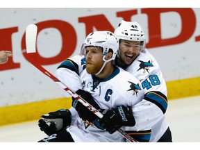 ST LOUIS, MO - MAY 23: Joe Pavelski #8 of the San Jose Sharks celebrates with Tomas Hertl #48 after scoring a third period goal against the St. Louis Blues in Game Five of the Western Conference Final during the 2016 NHL Stanley Cup Playoffs at Scottrade Center on May 23, 2016 in St Louis, Missouri.   Jamie Squire/Getty Images/AFP == FOR NEWSPAPERS, INTERNET, TELCOS & TELEVISION USE ONLY ==