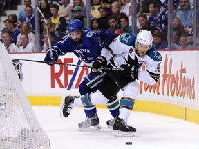 San Jose’s Joe Pavelski battles with Vancouver’s Dan Hamhuis during Game Five of the Western Conference Finals during the 2011 Stanley Cup Playoffs at Rogers Arena. Both players are still with their respective teams — for now, in Hamhuis’s case — but the Sharks have seen their team rebuilt while the Canucks haven’t been able to change their aging core.