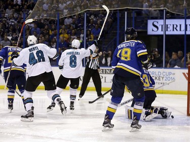 San Jose Sharks center Joe Pavelski (8) celebrates after scoring a goal during the third period in Game 5 of the NHL hockey Stanley Cup Western Conference finals against the St. Louis Blues, Monday, May 23, 2016, in St. Louis. (AP Photo/Jeff Roberson)  ORG XMIT: MOJR124