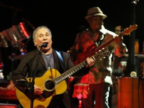 Paul Simon performs at the Queen Elizabeth Theatre Thursday evening.