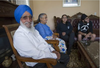 Bikrangit Singh Pandher, 76, plays a Punjabi card game with his grandson, far right, almost every evening.