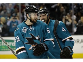 SAN JOSE, CA - MAY 25: Brenden Dillon #4 and Melker Karlsson #68 of the San Jose Sharks celebrate after they beat the St. Louis Blues in Game Six of the Western Conference Final during the 2016 NHL Stanley Cup Playoffs at SAP Center on May 25, 2016 in San Jose, California.