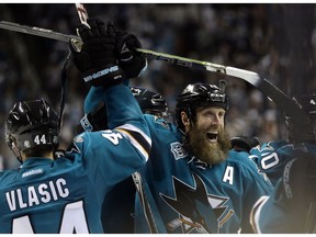 SAN JOSE, CA - MAY 25:  Joe Thornton #19 of the San Jose Sharks celebrates with Marc-Edouard Vlasic #44 of the San Jose Sharks after they beat the St. Louis Blues in Game Six of the Western Conference Final during the 2016 NHL Stanley Cup Playoffs at SAP Center on May 25, 2016 in San Jose, California.