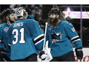 SAN JOSE, CA - MAY 19:  Martin Jones #31 of the San Jose Sharks celebrates with Brent Burns #88 after their 3-0 win over the St. Louis Blues in game three of the Western Conference Finals during the 2016 NHL Stanley Cup Playoffs at SAP Center on May 19, 2016 in San Jose, California.
