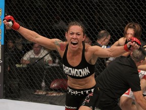 Cris "Cyborg" Santos reacts to her knockout victory over Hiroko Yamanaka during the Strikeforce event at the Valley View Casino Center on December 17, 2011 in San Diego, Calif.