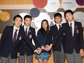 Students organizing Hand in Hand Society are (left to right) Gary Xin, 14, from St. Georges; Thomas Wang, 15, St. Georges; Andrea Wang, 12, Collingwood; Tony Dai, 14, St. Georges; and Andrew Hu, 13, St. Georges