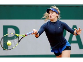 Canada's Eugenie Bouchard serves the ball to Germany's Laura Siegemund during their women's first round match at the Roland Garros 2016 French Tennis Open in Paris on May 24, 2016. /