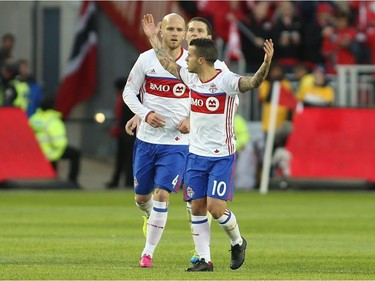 Toronto FC forward Sebastian Giovinco (10) celebrates his goal against Vancouver Whitecaps during the first half of MLS action in Toronto on Saturday, May 14, 2016.