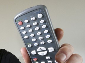 Grey Bruce Health Unit health promoter Jason Weppler holds up an unplugged TV cord and a powered down TV remote on Wednesday, May 4, 2016 in Owen Sound, Ont. Weppler and the staff at the GBHU are working to promote their 14th annual Turn Off The Screens challenge which runs from May 2 Ð 8. The GBHU is challenging students and their families do their best to get off the couch and get active by turning off the television, video game and computer. The event has been promoted to local schools. Students who increase their activity time while decreasing their screen time will be eligible to help their school win prizes. The top three participating schools, by percentage of overall students participating, will receive a mounted plaque for display.  According to Weppler it's not just a message for kids. He hopes people of all ages will turn off the screens and make time to be active.  James Masters/The Owen Sound Sun Times/Postmedia Network