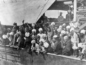 Passengers wait in Vancouver harbour aboard the Komagata Maru in 1914, in a photo by John Thomas Woodruff from 100 Photos That Changed Canada.