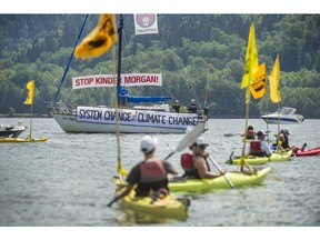 Climate change activists surrounded the Kinder Morgan marine terminal on land and water in Burnaby on May 14, 2016.