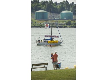 Climate change activists surrounded the Kinder Morgan marine terminal  on land and water in Burnaby, BC. May 14, 2016.