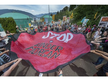 Climate change activists surrounded the Kinder Morgan marine terminal on land and water in Burnaby on May 14, 2016.