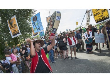 Climate change activists surrounded the Kinder Morgan marine terminal on land and water in Burnaby on May 14, 2016.