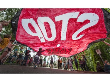 Climate change activists surrounded the Kinder Morgan marine terminal on land and water in Burnaby on May 14, 2016.