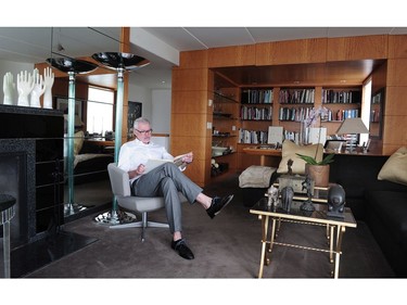 Robert Lemon in his living room. The library is at the back.