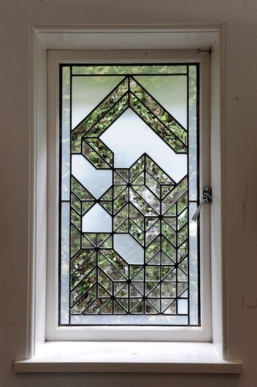 Three leaded glass windows by Lutz Haufschild were installed in the residence.