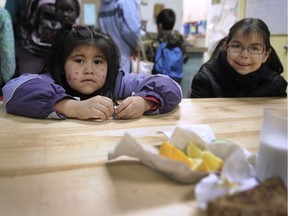 Children at a school breakfast program ssupported by Adopt-a-School donations.