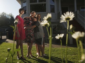Mary-Ellen Turpel-Lafond, with three her kids, from left, Isobel,14, Isaiah, 12, and Portia, 14, at home in Victoria, B.C.