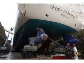 VICTORIA, B.C.: Thursday, May 20, 2016 -- The Crystal Serenity Cruise Ship at the Esquimalt Graving Docks in Esquimalt, B.C., Thursday, May 19, 2016.  Up to 600 trades workers have been busy over the past 10-12 days painting and other maintenance on the 250-metre Crystal Serenity. For Derek Penner business story on the cruise ship industry, Vancouver Sun. Photo credit Chad Hipolito [PNG Merlin Archive]