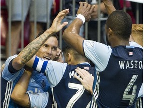 VANCOUVER May 11 2016. Vancouver Whitecaps FC  #27 Blas Perez celebrates his goal on the Chicago Fire with tam mates #77 Pedro Morales and #4 Kendall Waston in a regular season MLS soccer game at BC Place,  Vancouver May 11 2016. ( Gerry Kahrmann  /  PNG staff photo)   ( For Prov / Sun Sports ) 00043162A [PNG Merlin Archive]