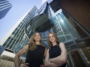 Ashley O'Neill, CBRE's vice-president of corporate strategy, right, seen outside CBRE's Vancouver offices on Monday with Tara Finnegan, CBRE vice president of brokerage services , left, says women in the commercial real estate industry should "take on roles that challenge us and not be afraid to jump in with two feet."