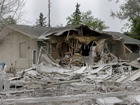 A fire damaged home in downtown Fort McMurray on June 1, 2016.