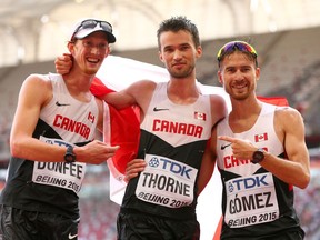 Ben Thorne, flanked by his Racewalk West teammates Evan Dunfee (left) and Inaki Gomez (right), at the 2015 IAAF World Athletics Championships in Beijing, China, last August. Thorne had just finished third in the 20K race walk event, as all three competed for Canada.