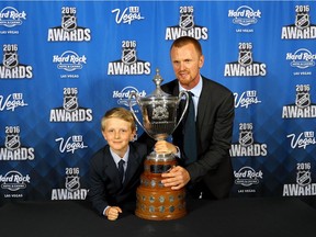 Henrik Sedin of the Vancouver Canuks and son Valter Sedin pose after Henrik wins the King Clancy Memorial Trophy for leadership on and off the ice and noteworthy humanitarian contribution to community at the 2016 NHL Awards at the Hard Rock Hotel & Casino on June 22, 2016 in Las Vegas, Nevada.