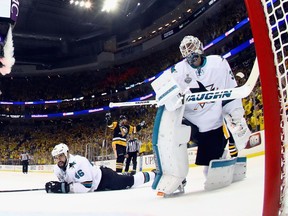 San Jose Sharks Roman Polak and goalie Martin Jones can only look on after a second-period goal by the Pittsburgh Penguins’ Phil Kessel during Game 2 of the 2016 Stanley Cup Final at Consol Energy Center in Pittsburgh on Wednesday.