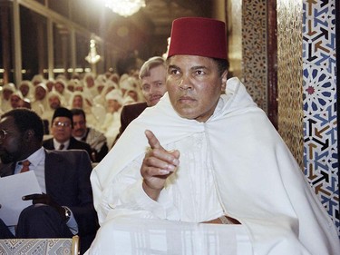 (FILES) This file photo taken on January 15, 1998 shows Former World Heavyweight Champion Muhammad Ali participating in a religious ceremony for the holy month of Ramadan in the Royal Palace in Rabat. Boxing legend Muhammad Ali, dies at 74. The former heavyweight world champion was hospitalized on Thursday at a Phoenix, Arizona, hospital with a respiratory issue, which US media reported was complicated by his Parkinson's disease.  / AFP PHOTO / ABDELHAK SENNAABDELHAK SENNA/AFP/Getty Images
