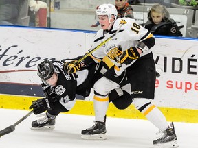 Pierre-Luc Dubois, right, checks all the boxes the Canucks are looking for in a player to draft, including the physical side of his game.