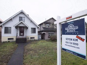 A sold home is pictured in Vancouver, B.C., Thursday, Feb. 11, 2016. The Real Estate Board of Greater Vancouver says May was another record-breaking month for housing sales in the region, with sellers continuing to rule the market.